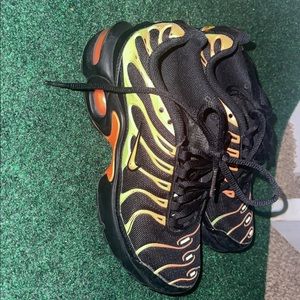 Nike Air Max Plus Black, yellow and orange.